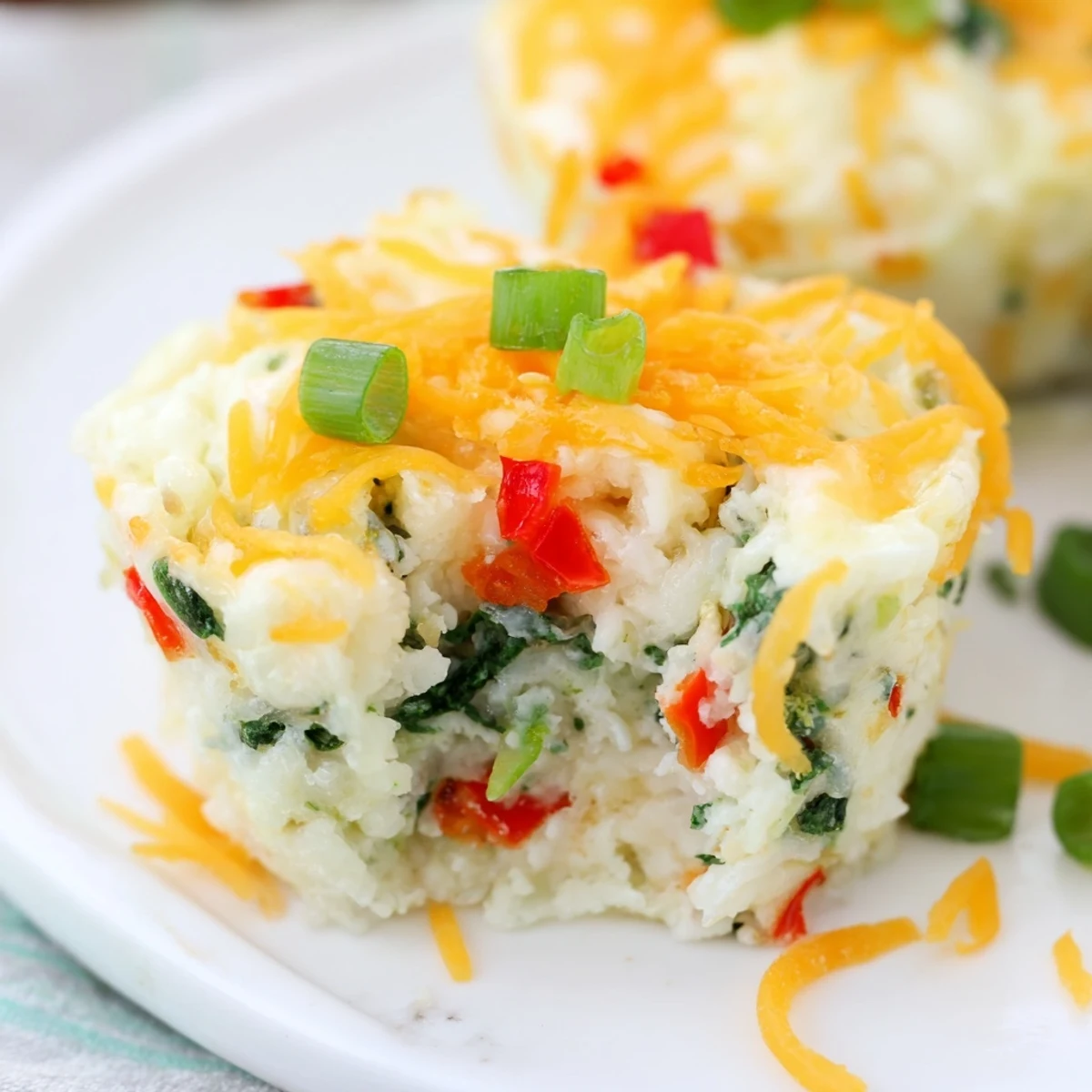 Savory Cottage Cheese Egg Bites cooling on a wire rack, perfect for a high-protein American breakfast or snack.