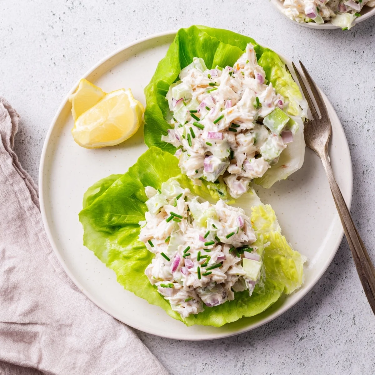 Fluffy Crab Salad mixed with crunchy celery and cucumber, ready to be enjoyed chilled as a refreshing light lunch.