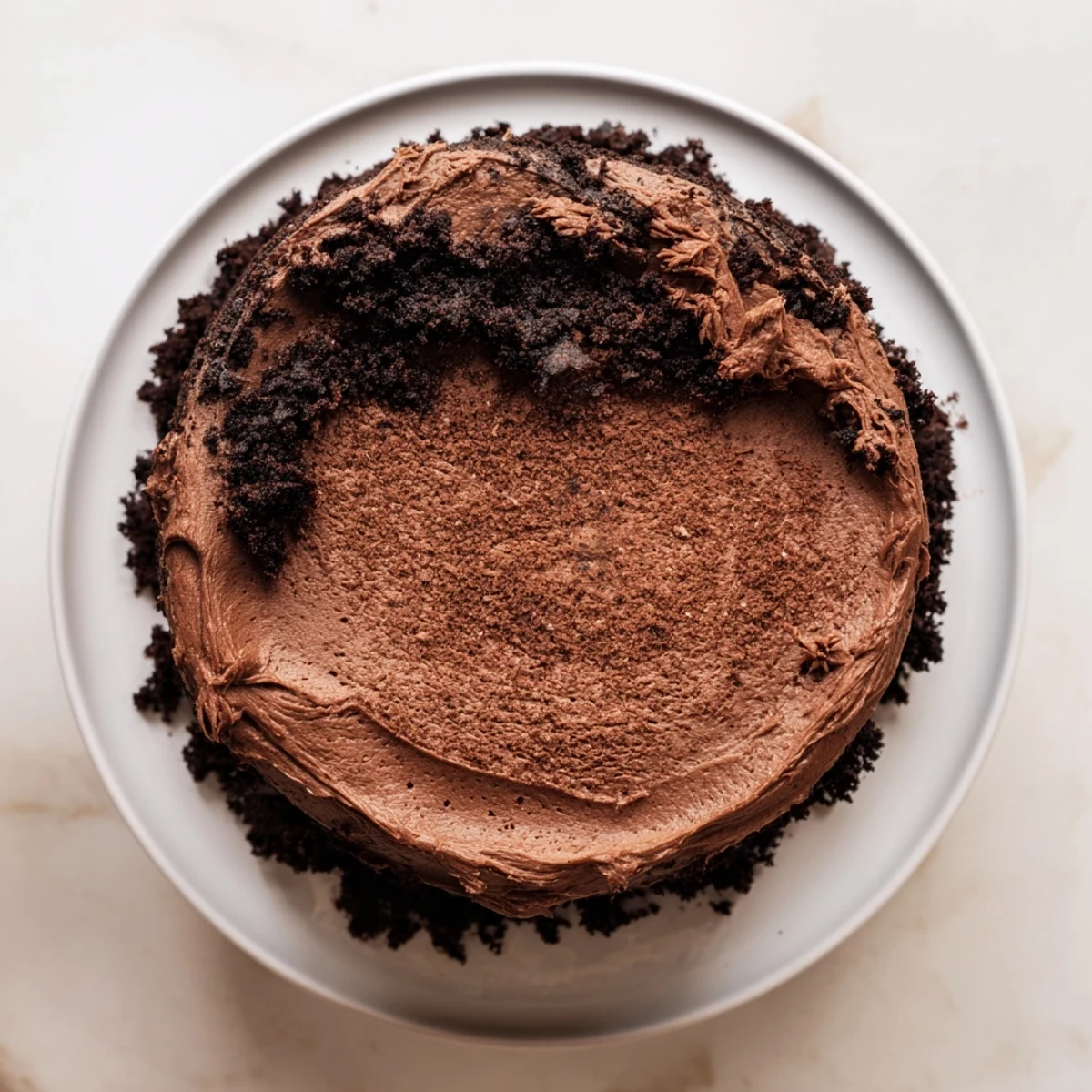 Two-layer Matildas Chocolate Cake topped with rich ganache and chocolate shavings for dessert