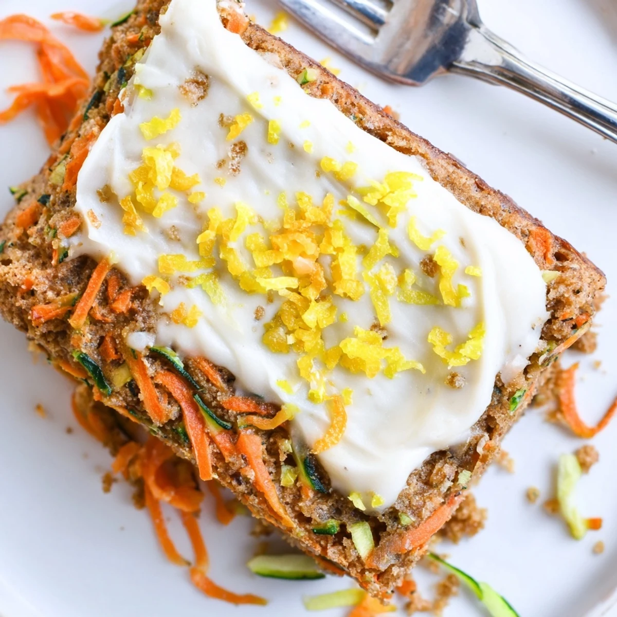 Moist home baked Spiced Ginger Carrot And Zucchini Bars With Lemon Cream Cheese Frosting